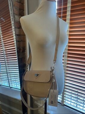 Patent-Style Beige Crossbody Bag with Triangular Accent